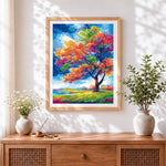 Finished vibrant autumn tree cross stitch artwork displayed