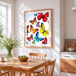 Vibrant butterfly collection cross stitch artwork displayed on wall as home decor