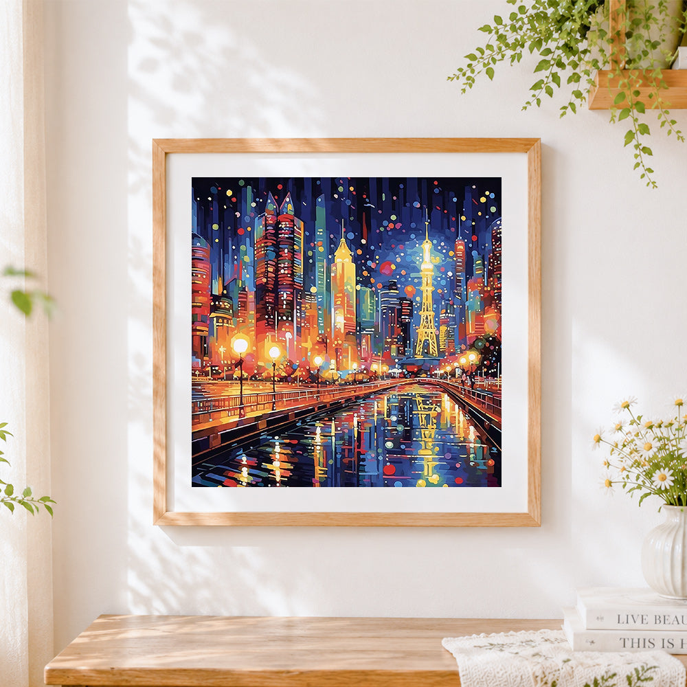 Finished vibrant city lights cross stitch artwork displayed