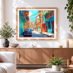 Finished vibrant cuban street scene cross stitch artwork displayed