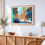 Vibrant cuban street scene cross stitch artwork displayed on wall as home decor