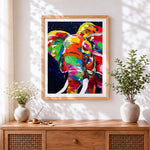 Finished vibrant elephant close up cross stitch artwork displayed
