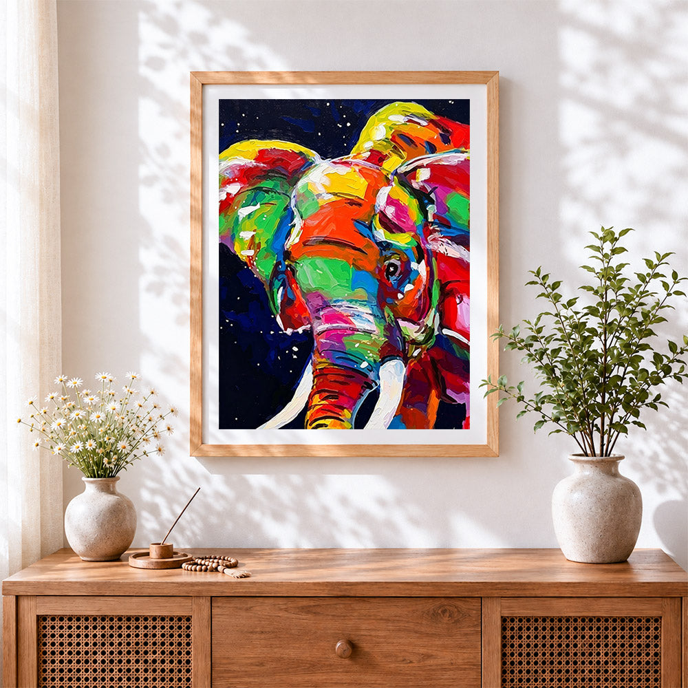 Finished vibrant elephant close up cross stitch artwork displayed
