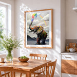 Vibrant elephant with rainbow cross stitch artwork displayed on wall as home decor