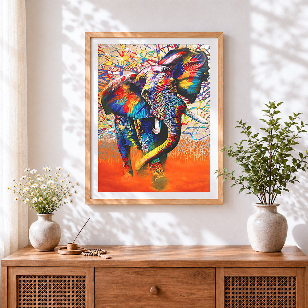 Finished vibrant expressionist elephant cross stitch artwork displayed