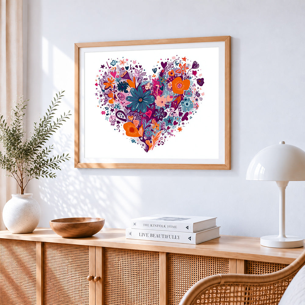 Vibrant floral heart cross stitch artwork displayed on wall as home decor