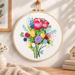 Vibrant flower bouquet embroidery hoop wall art displayed as warm and cosy handmade home decor