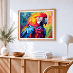 Vibrant geometric macaw cross stitch artwork displayed on wall as home decor