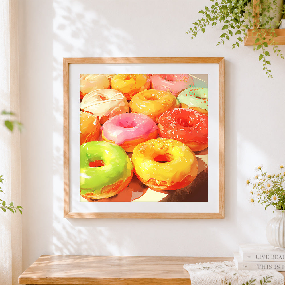 Finished vibrant glazed donuts cross stitch artwork displayed