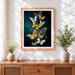 Finished vibrant gold and white butterflies cross stitch artwork displayed