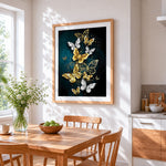 Vibrant gold and white butterflies cross stitch artwork displayed on wall as home decor