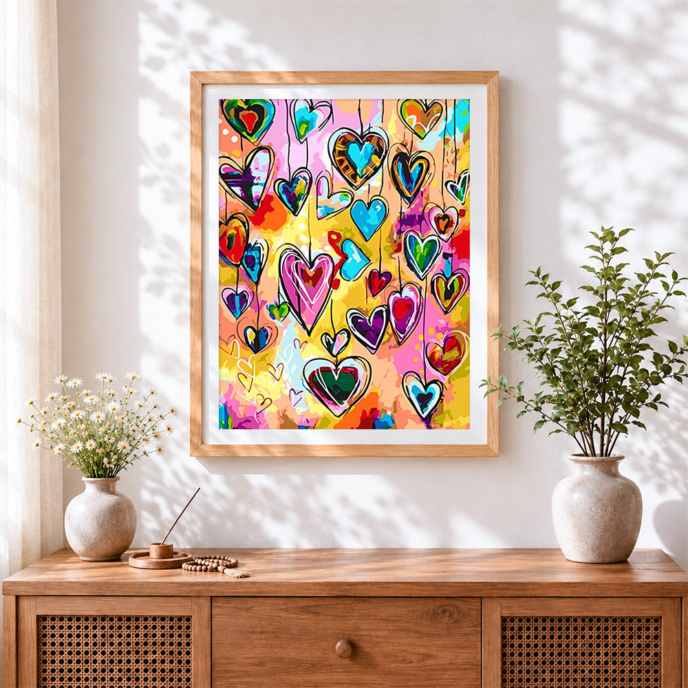 Finished vibrant heart doodles cross stitch artwork displayed