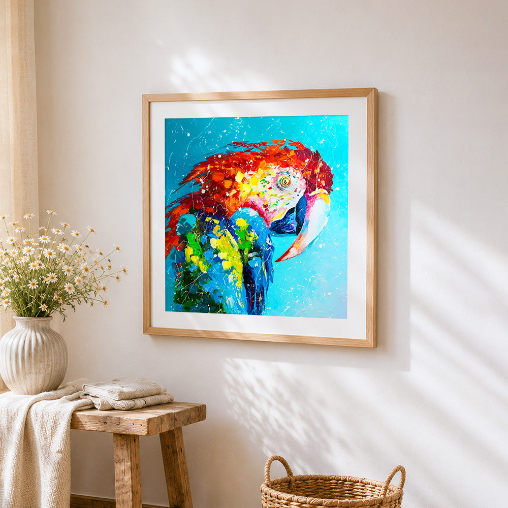 Vibrant macaw cross stitch artwork displayed on wall as home decor