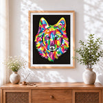 Finished vibrant modern wolf cross stitch artwork displayed