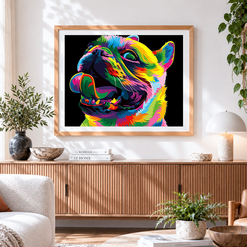 Finished vibrant pop art bulldog cross stitch artwork displayed