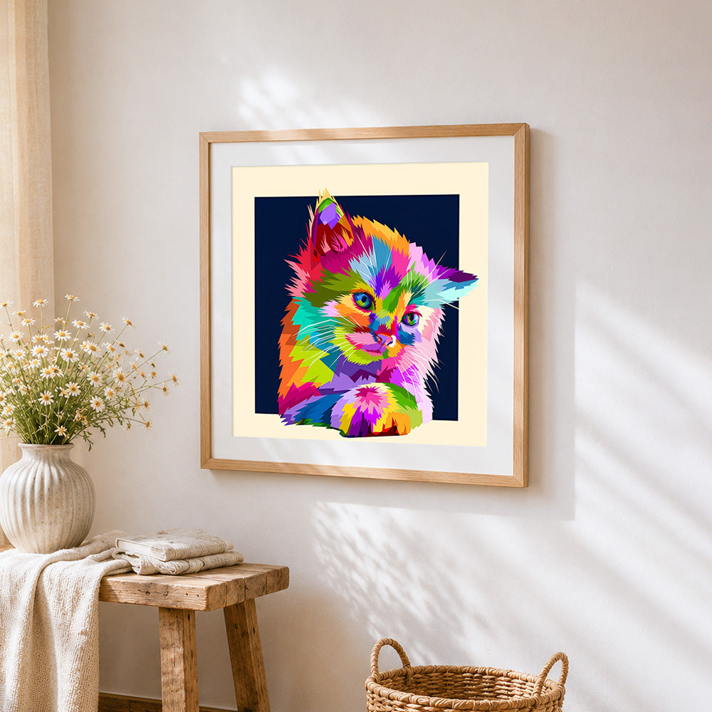 Vibrant pop art cat cross stitch artwork displayed on wall as home decor