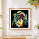 Finished vibrant pop art chimpanzee portrait paint by numbers artwork displayed as home decor