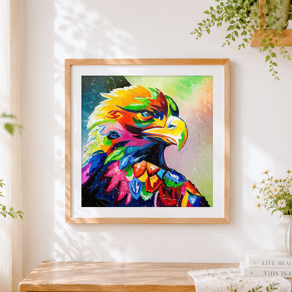 Finished vibrant pop art eagle portrait cross stitch artwork displayed