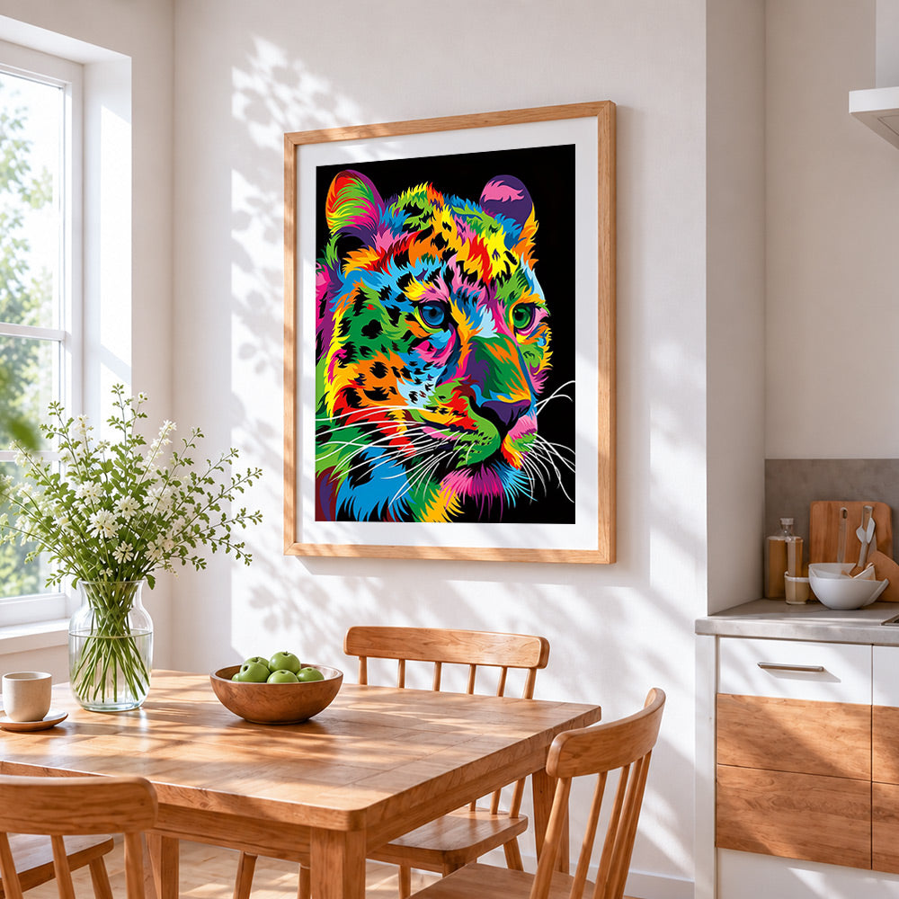 Vibrant pop art leopard cross stitch artwork displayed on wall as home decor