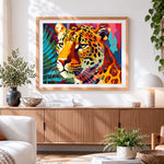 Finished vibrant pop art leopard portrait cross stitch artwork displayed