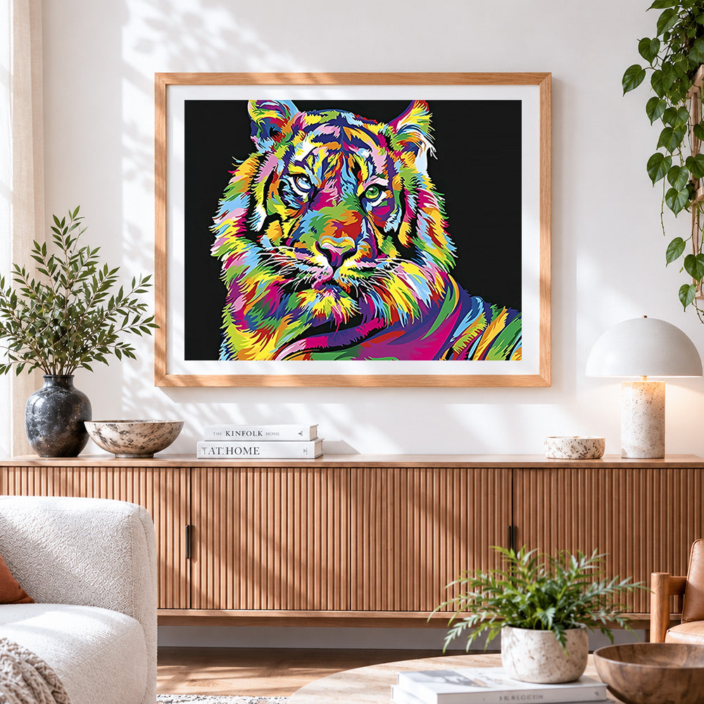 Finished vibrant pop art rainbow tiger cross stitch artwork displayed