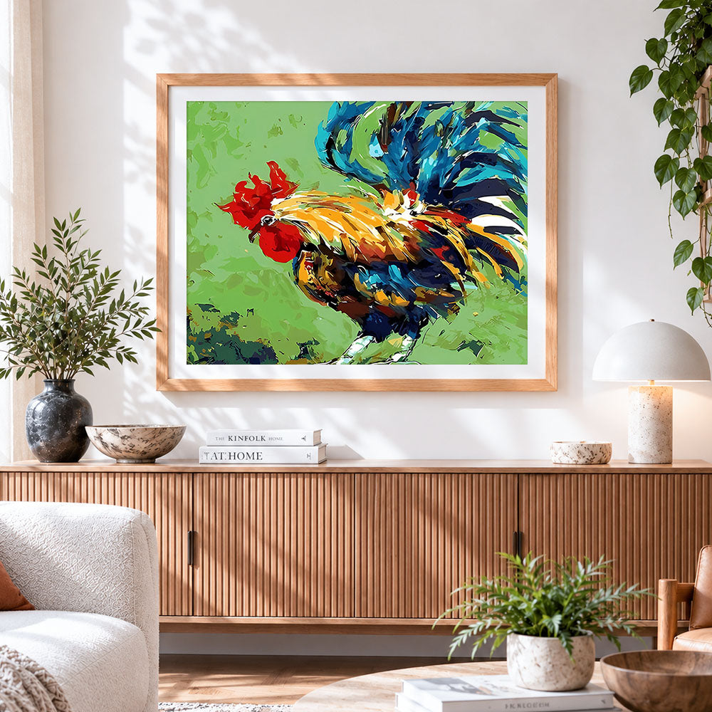 Finished vibrant pop art rooster cross stitch artwork displayed