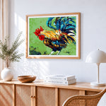Vibrant pop art rooster cross stitch artwork displayed on wall as home decor
