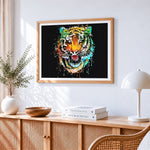 Vibrant pop art tiger head cross stitch artwork displayed on wall as home decor