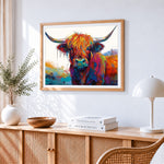 Vibrant rainbow highland cow paint by numbers artwork displayed on wall as home decor
