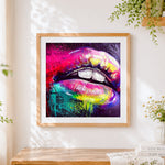 Finished vibrant rainbow lips cross stitch artwork displayed