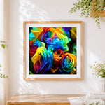 Finished vibrant rainbow rose bouquet cross stitch artwork displayed