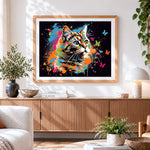 Finished vibrant splatter cat with butterflies paint by numbers artwork displayed as home decor
