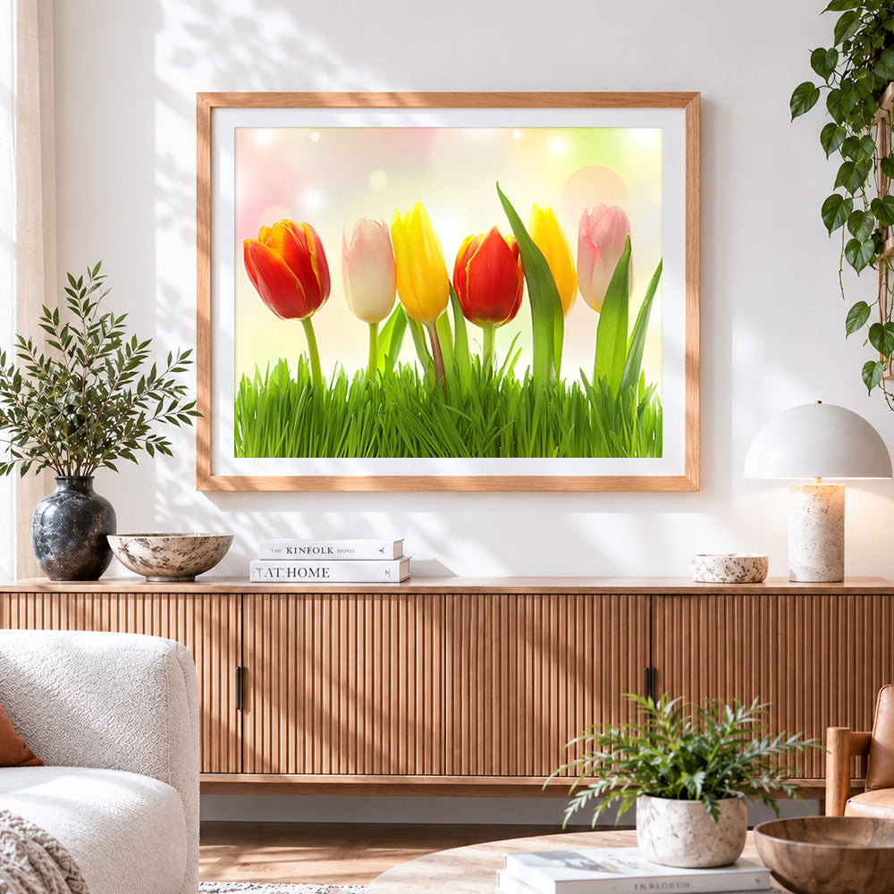 Finished vibrant spring tulips cross stitch artwork displayed