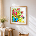 Vibrant tulips and colourful butterflies cross stitch artwork displayed on wall as home decor
