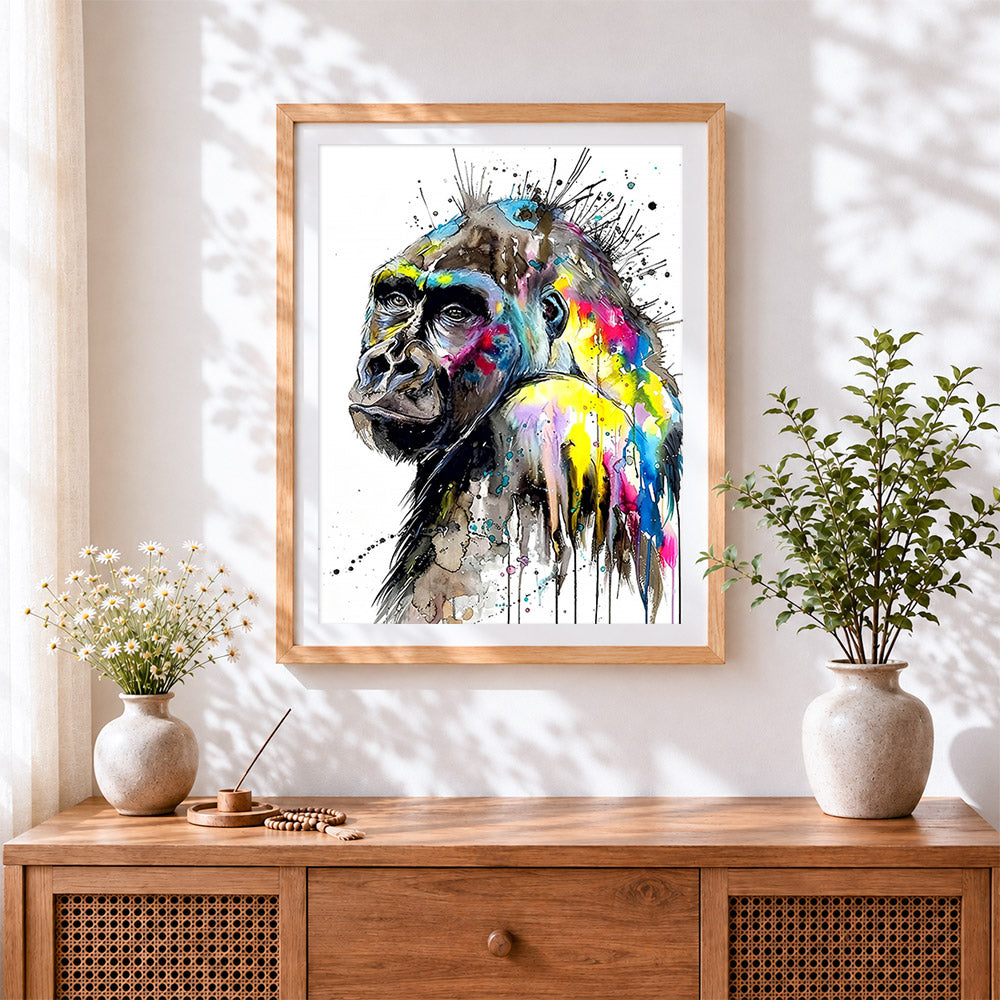 Finished vibrant watercolour gorilla cross stitch artwork displayed