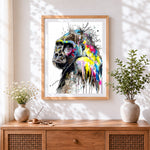 Finished vibrant watercolour gorilla cross stitch artwork displayed