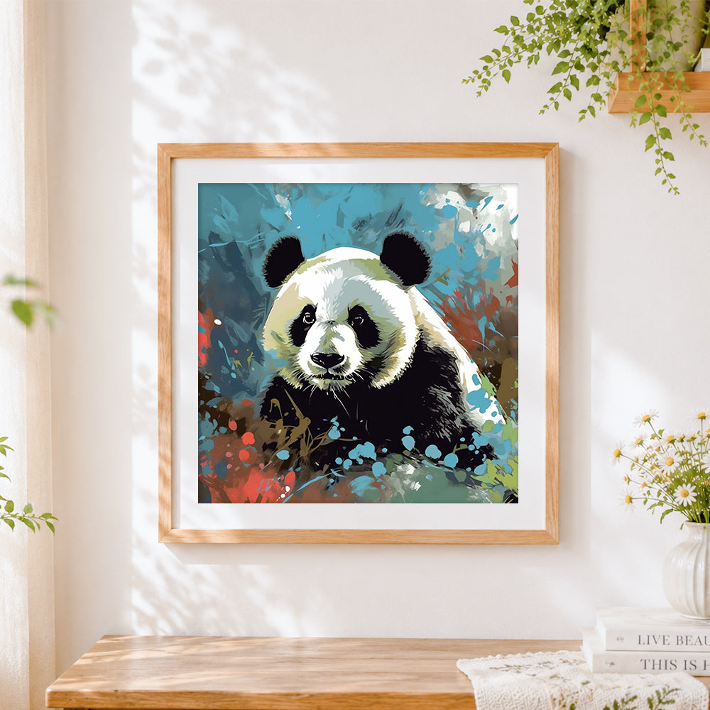 Finished vibrant watercolour panda cross stitch artwork displayed