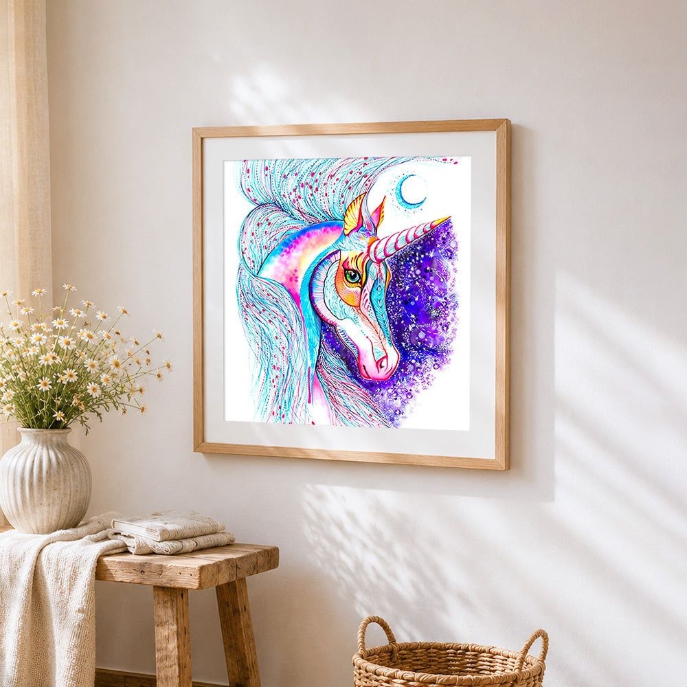 Vibrant watercolour unicorn with moon cross stitch artwork displayed on wall as home decor