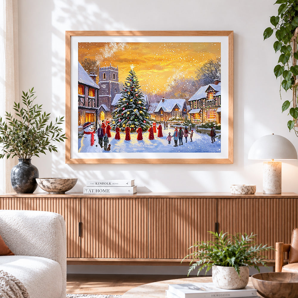 Finished village carol singers and christmas tree cross stitch artwork displayed