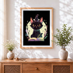 Finished vintage black cat with a book cross stitch artwork displayed