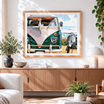 Finished vintage camper van and scooter cross stitch artwork displayed