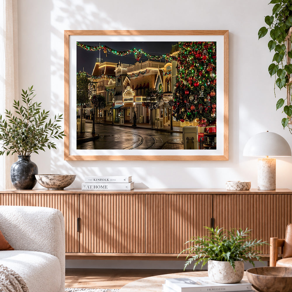 Finished vintage festive high street at night cross stitch artwork displayed