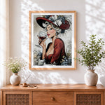 Finished vintage lady with wine glass cross stitch artwork displayed