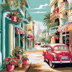 Vintage red car on a tropical street cross stitch kit for beginners