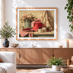 Finished vintage red enamel pot and cherries cross stitch artwork displayed