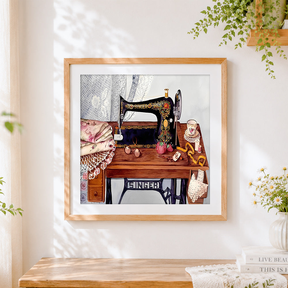 Finished vintage singer sewing machine cross stitch artwork displayed