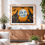 Finished vintage style black cats and batty moon cross stitch artwork displayed