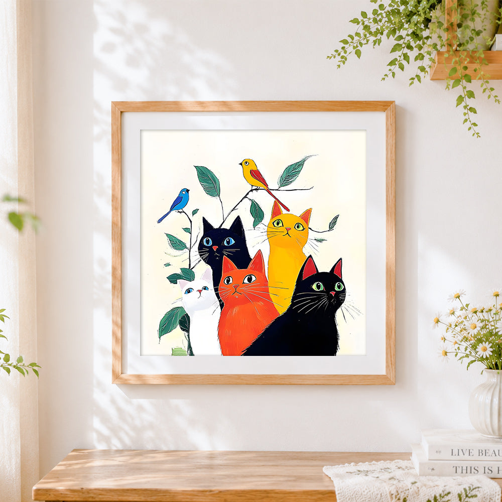 Finished vintage style colourful cats and birds cross stitch artwork displayed