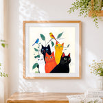 Finished vintage style colourful cats and birds cross stitch artwork displayed