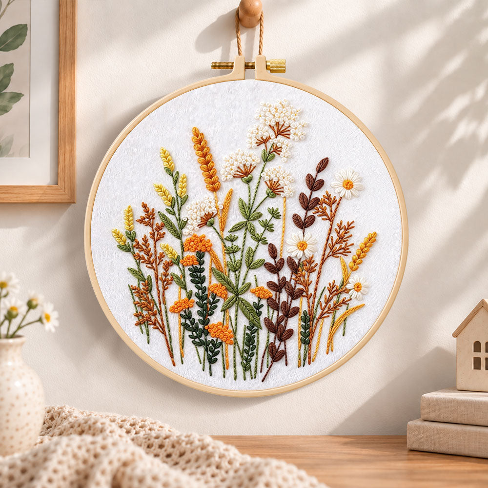 Warm tone dried florals embroidery hoop wall art displayed as warm and cosy handmade home decor